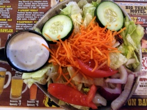 There is a face somewhere in this salad.