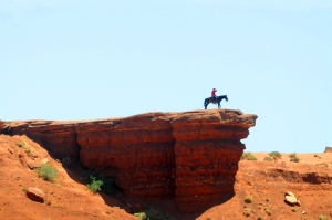 This cowboy and his horse replicate an iconic photo that was taken in Monument Valley.